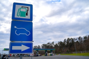 sign for charging and gas station